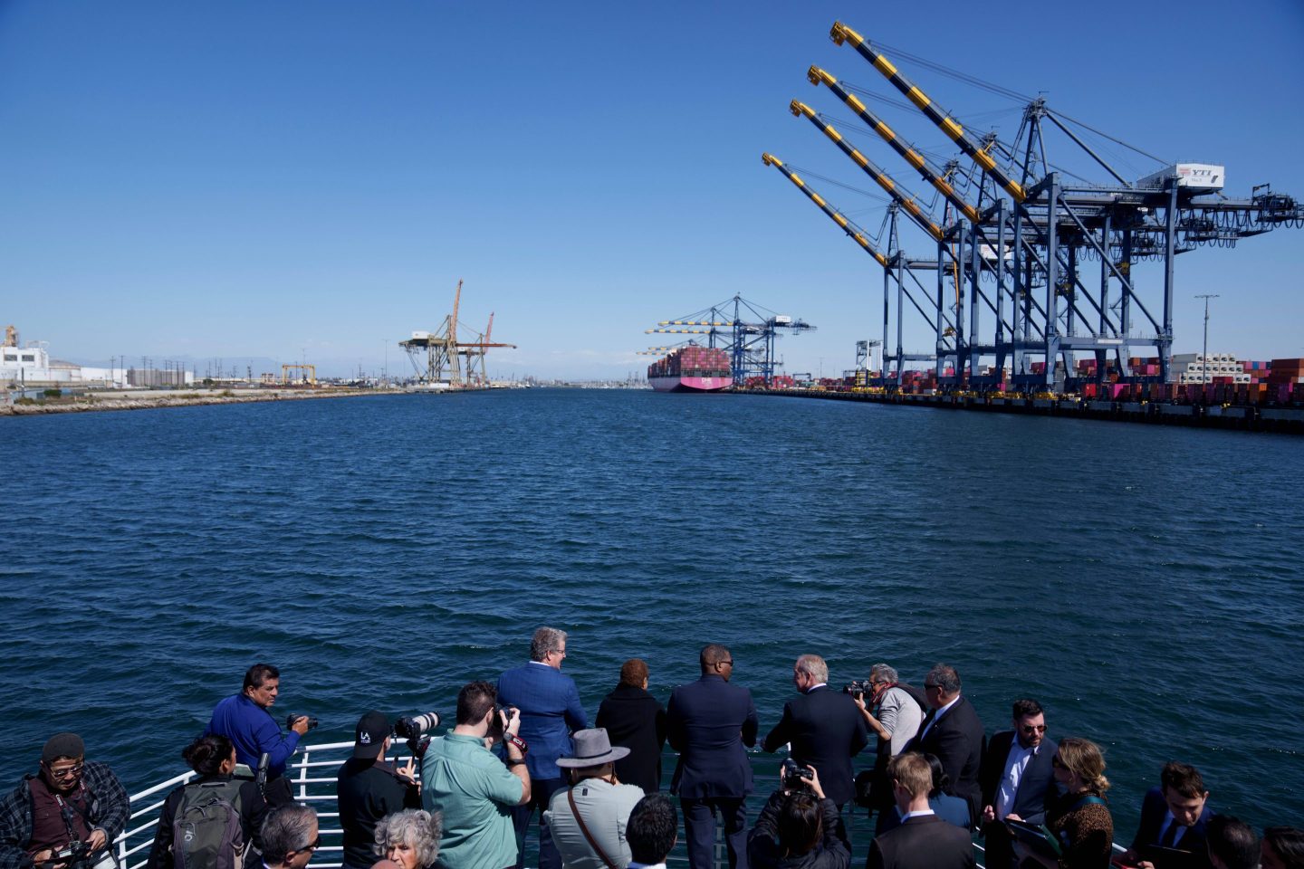 Tim McOsker, Los Angeles city councilman, from center left, Karen Bass, mayor of Los Angeles, Michael Regan, administrator of the US Environmental Protection Agency (EPA), and Gene Seroka, executive director of the Port of Los Angeles, during a boat tour of the Port of Los Angeles in Wilmington, California, US, on Thursday, March 14, 2024. Officials are visiting the port to discuss air pollution suffered by nearby residents as the federal government works to invest in zero-emission port equipment and infrastructure. Photographer: Eric Thayer/Bloomberg via Getty Images