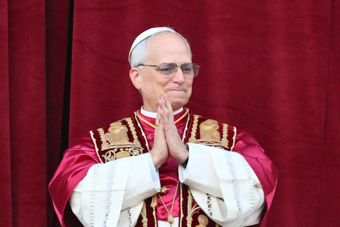Newly elected Pope Leo XIV, Robert Prevost arrives on the main central loggia balcony of the St Peter&#039;s Basilica for the first time, after the cardinals ended the conclave, in The Vatican, on May 8, 2025. Robert Francis Prevost was on Thursday elected the first pope from the United States, the Vatican announced. A moderate who was close to Pope Francis and spent years as a missionary in Peru, he becomes the Catholic Church&#039;s 267th pontiff, taking the papal name Leo XIV. (Photo by Alberto PIZZOLI / AFP) (Photo by ALBERTO PIZZOLI/AFP via Getty Images)